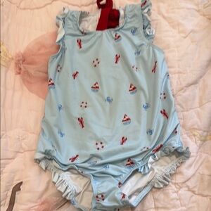 Light Blue Ruffled Swimsuit with Nautical Print